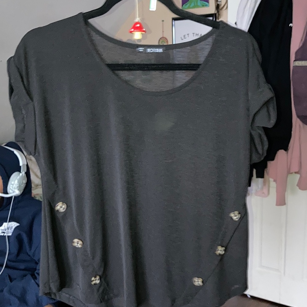 Black top with cuffed sleeve and bottoms